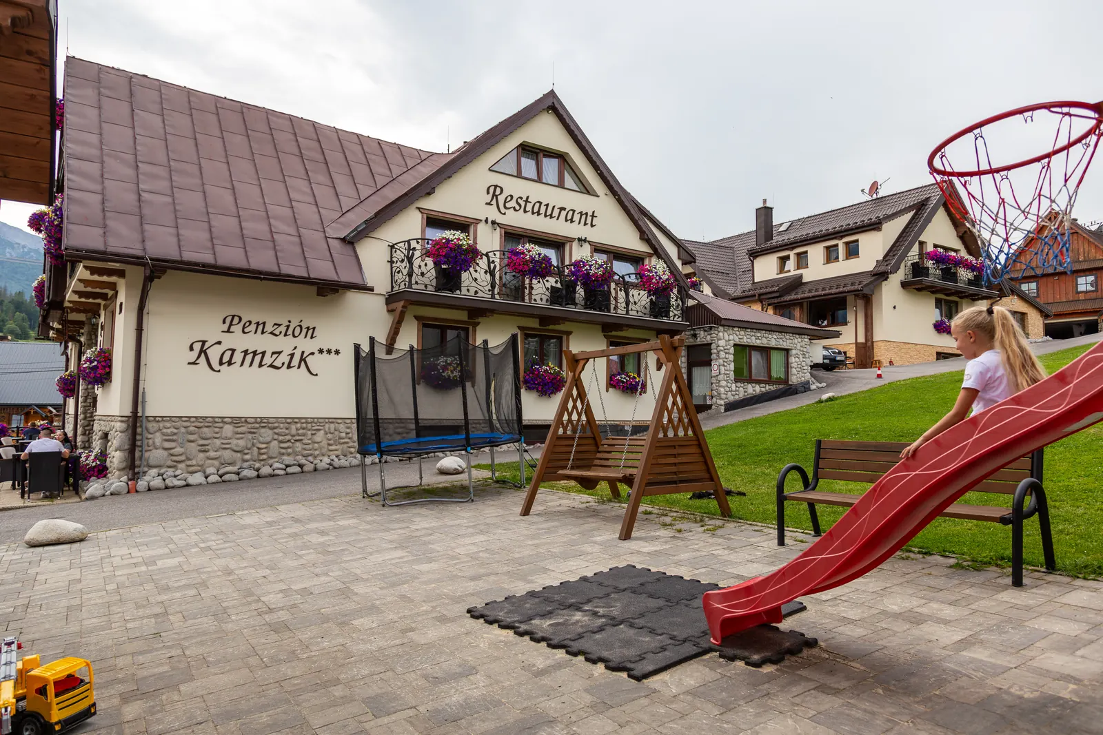 Slide and trampoline by the Kamzík Guesthouse